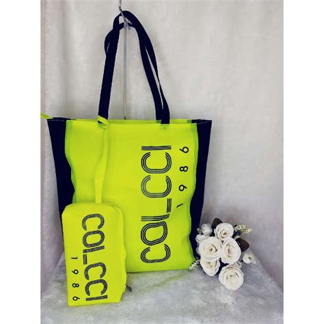 Bolsa colcci praia .